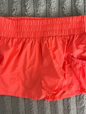 Free People Neon Coral Athletic Shorts